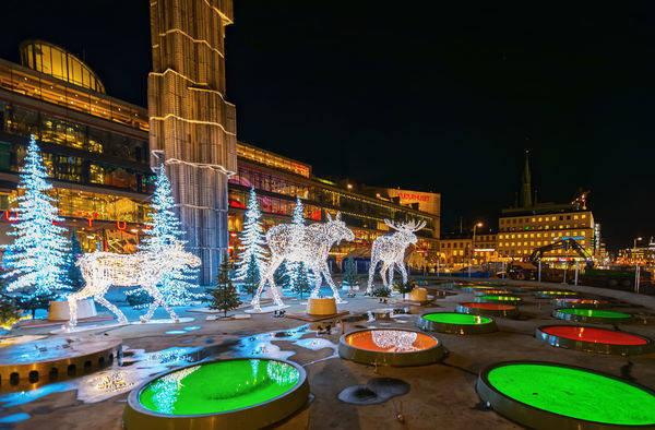 34018264 - stockholm - 25 nov: christmas decorations in forms of a moose family in the city centre of stockholm. 25 november 2014, sweden. sergels torg during renovation